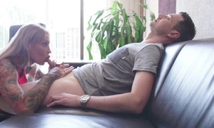 Eager bitch with tattoos wildly sucks and fucks lover's dick